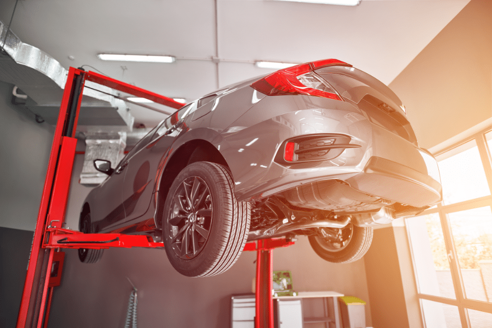 Japanese Car Repair in West Point, VA At Eltham Auto Clinic. Japanese car lifted on a hydraulic hoist in an auto repair shop