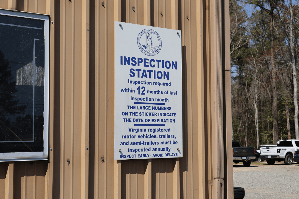 Virginia State Inspection in West Point, VA, at Eltham Auto Clinic. Virginia State Inspection Station sign outside a licensed auto repair shop offering official Virginia state safety inspections for cars, trucks, trailers, and commercial vehicles.